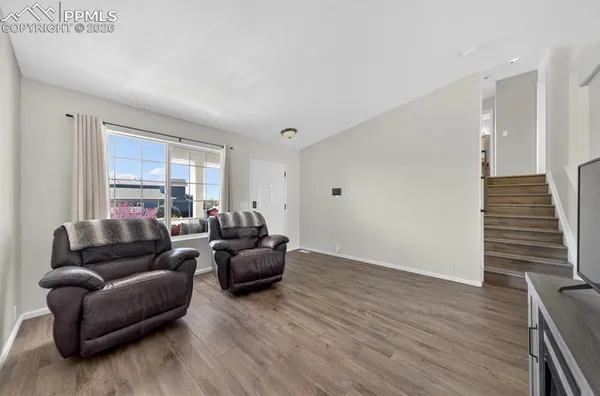 a kitchen with stainless steel appliances granite countertop a sink stove and microwave