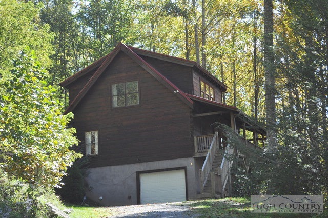 346-348 Grady Winkler Road Boone, NC 28607 - Photo 17 of 32 a house with trees in the background