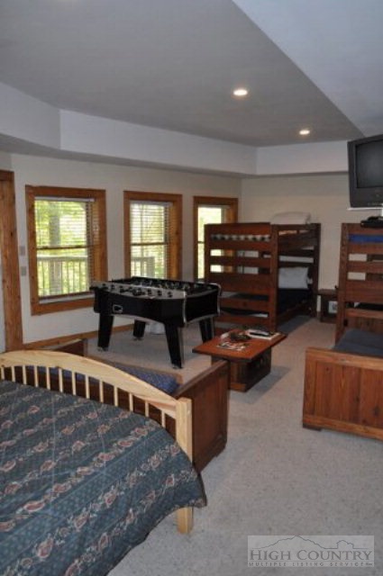 346-348 Grady Winkler Road Boone, NC 28607 - Photo 4 of 32 a living room with furniture and a flat screen tv