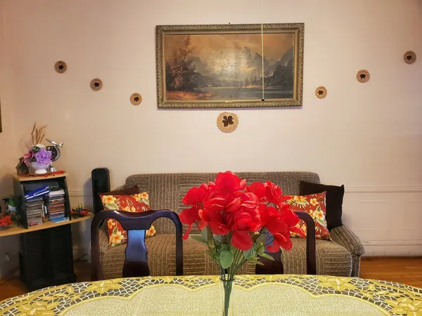 a room with furniture and a flat screen tv