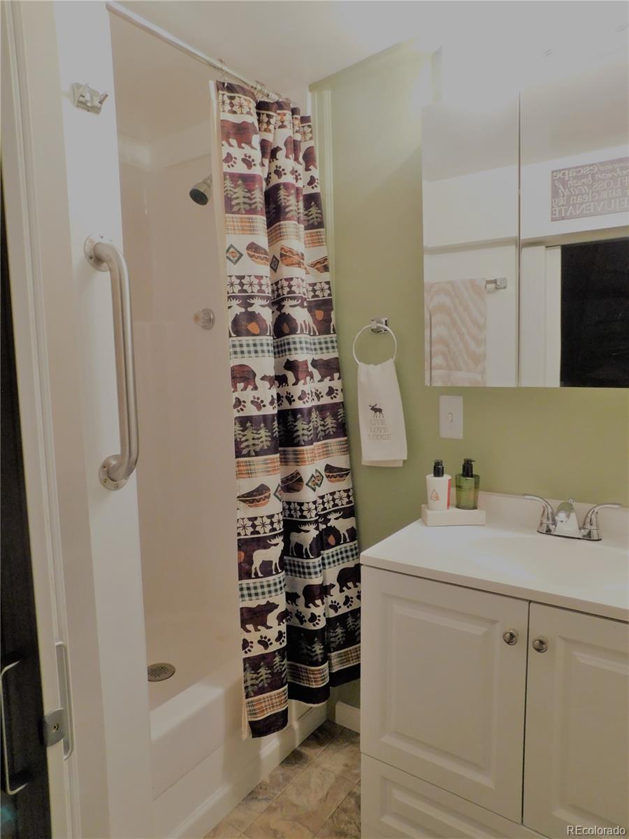 59501 County Rd GG Moffat, CO 81143 - Photo 15 of 25 a bathroom with a sink a toilet and shower