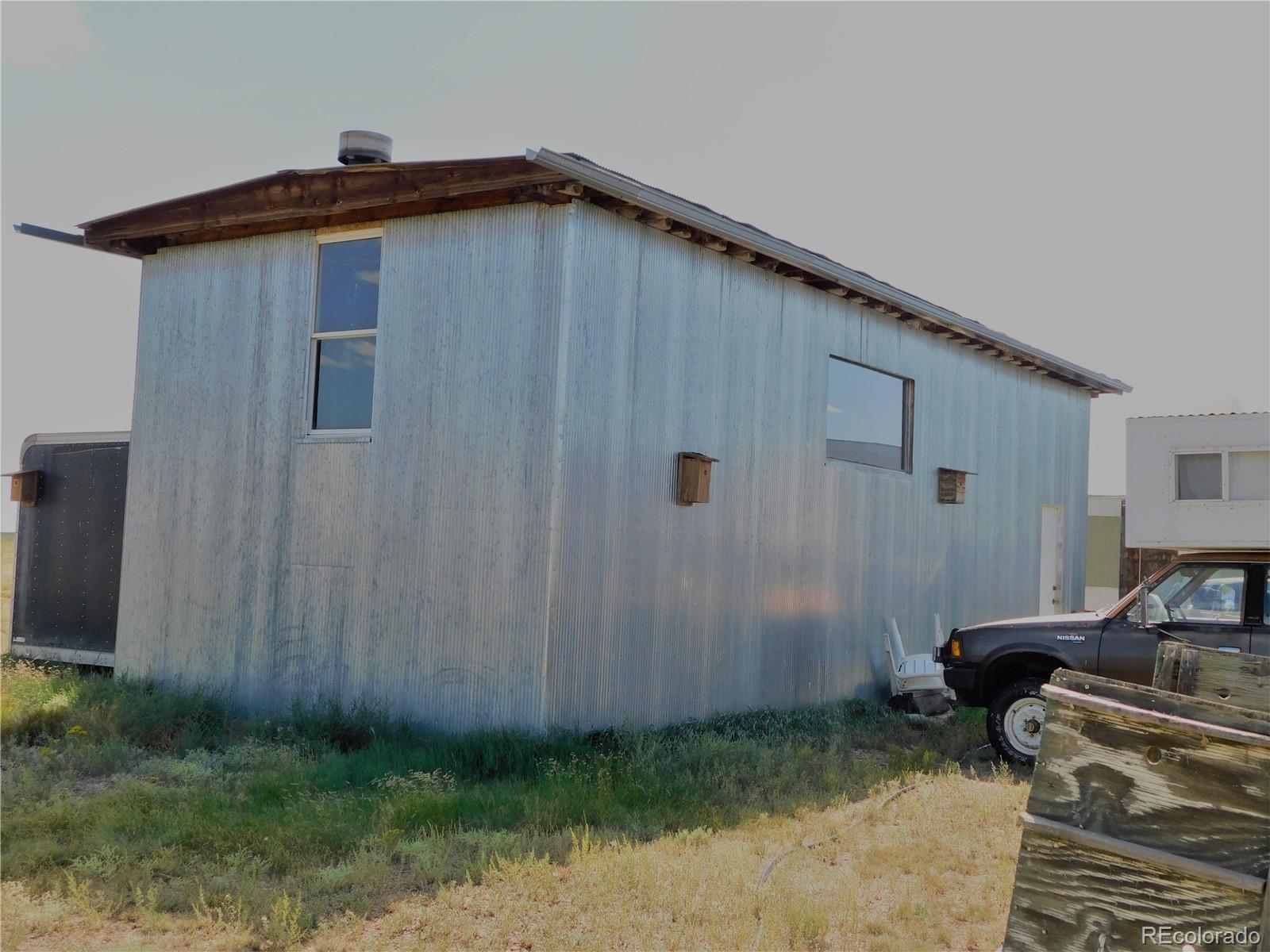 59501 County Rd GG Moffat, CO 81143 - Photo 21 of 25 a backyard of a house