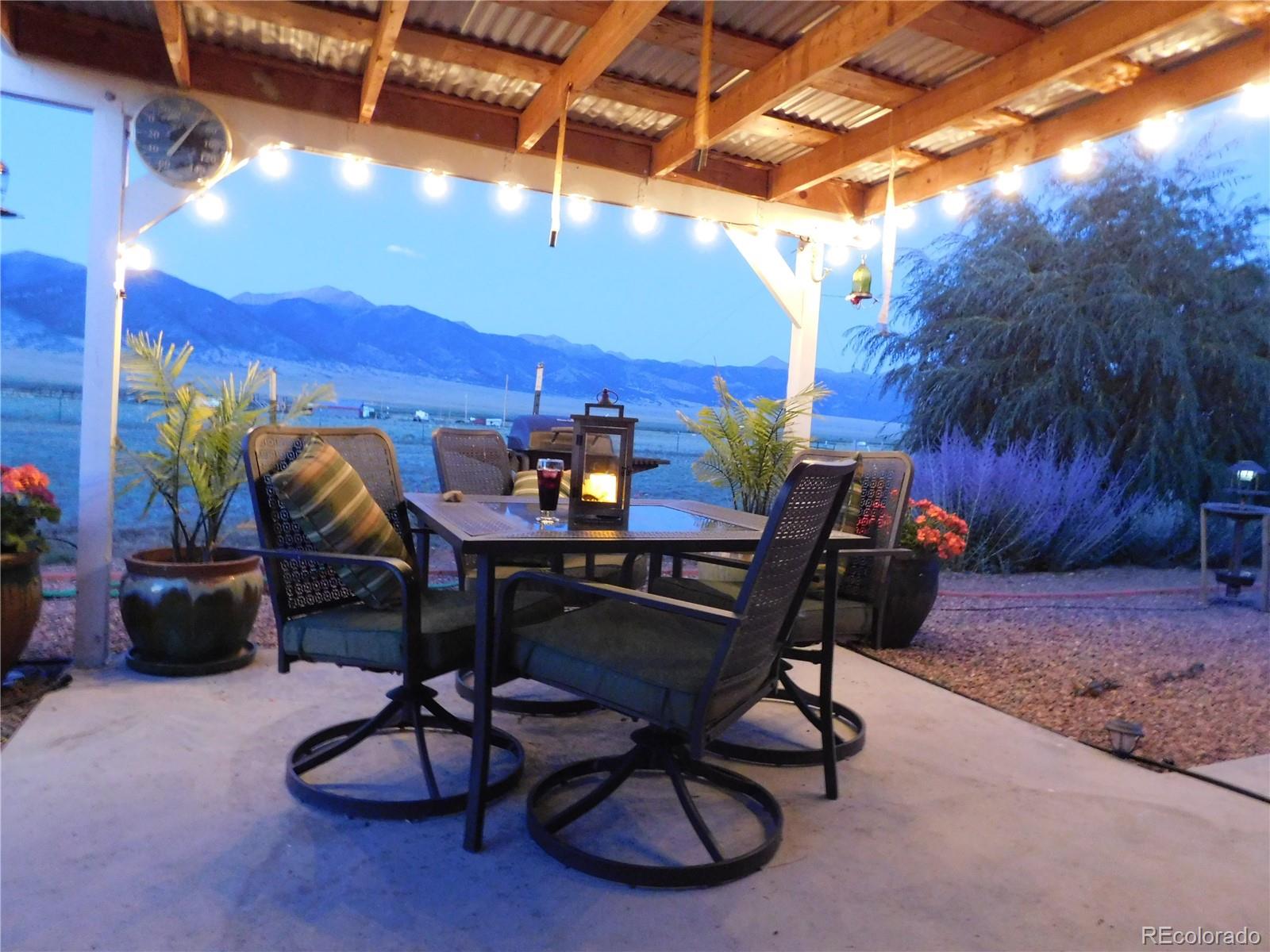 59501 County Rd GG Moffat, CO 81143 - Photo 23 of 25 a view of a chairs and table in patio