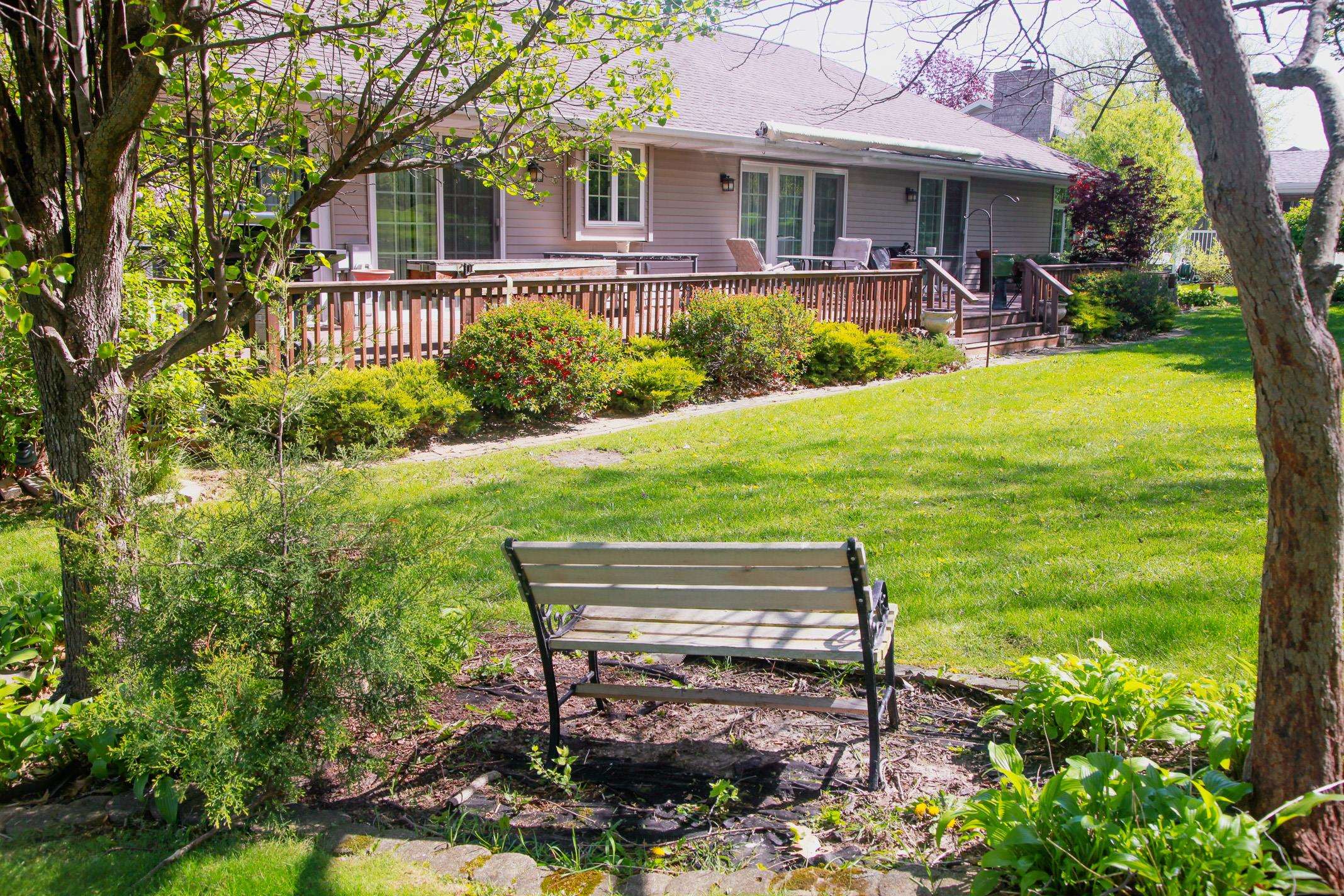 3001 Countryside Lane Freeport, IL 61032 - Photo 45 of 47 a view of a house with backyard porch and sitting area
