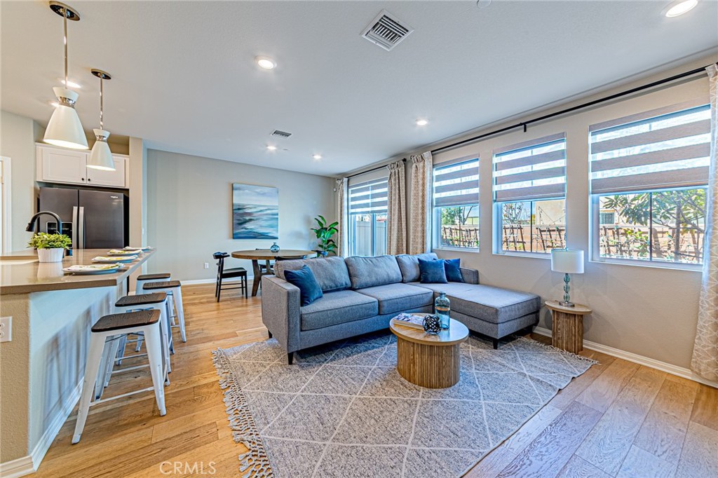 1705 Almond Tree Place Upland, CA 91784 - Photo 11 of 41 a living room with furniture and a large window