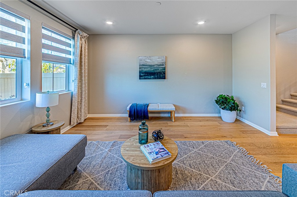 1705 Almond Tree Place Upland, CA 91784 - Photo 13 of 41 a living room with furniture and a potted plant