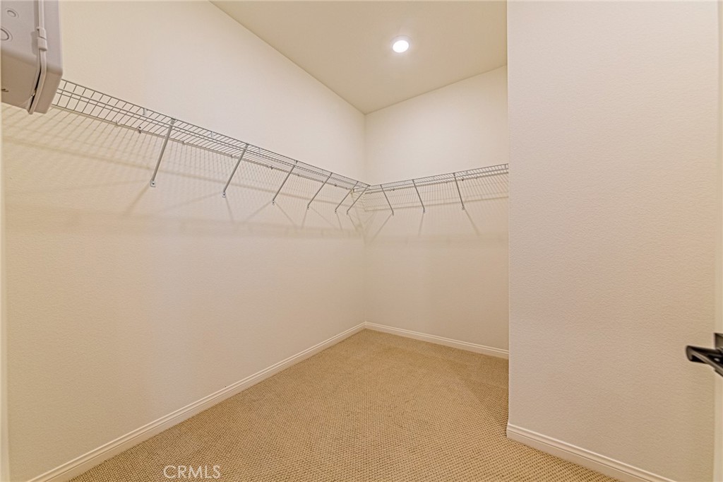 1705 Almond Tree Place Upland, CA 91784 - Photo 23 of 41 a view of a room with racks on the wall