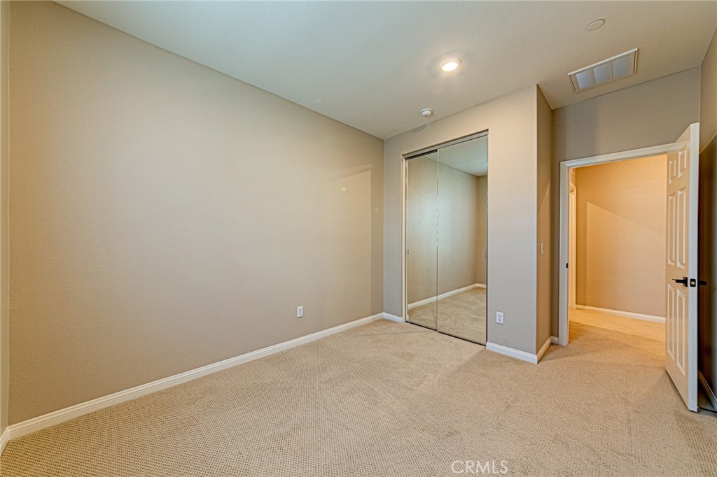 1705 Almond Tree Place Upland, CA 91784 - Photo 24 of 41 an empty room with closet area