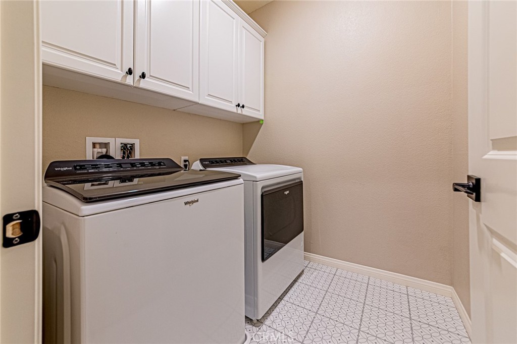 1705 Almond Tree Place Upland, CA 91784 - Photo 29 of 41 a utility room with dryer and washer