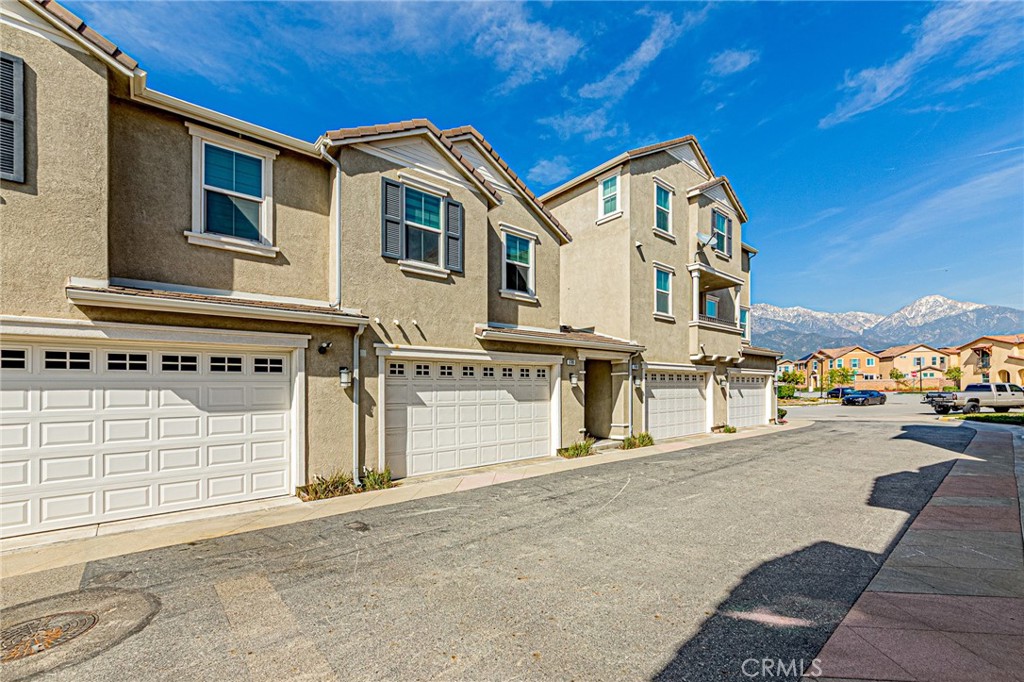 1705 Almond Tree Place Upland, CA 91784 - Photo 37 of 41 a front view of a house with a garage
