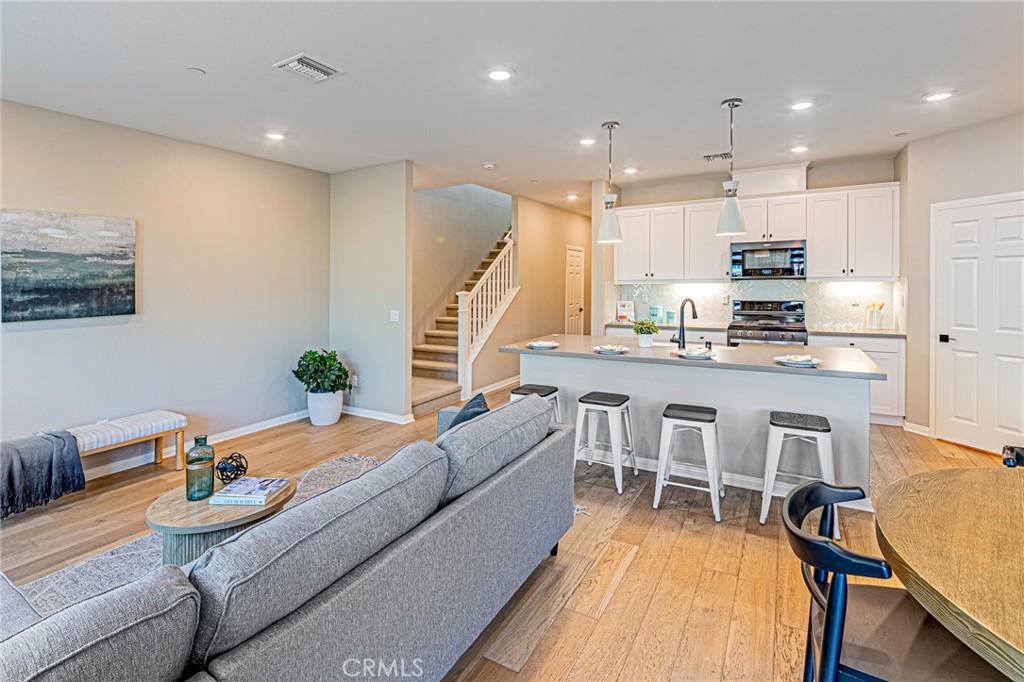 1705 Almond Tree Place Upland, CA 91784 - Photo 8 of 41 a dining hall with stainless steel appliances furniture dining table and chairs