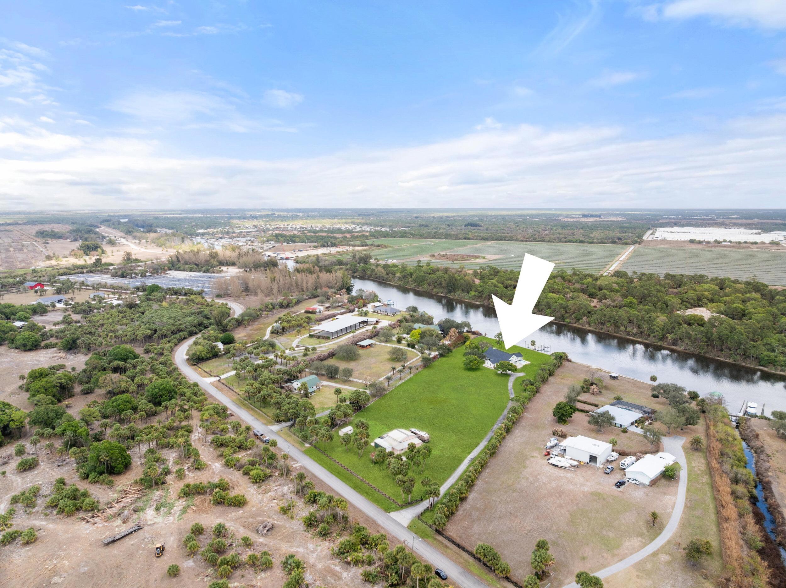 10125 Southwest Green Ridge Lane, Unit LANE Palm City, FL 34990 - Photo 63 of 84 65_dji_20260227035903_0129_d.1