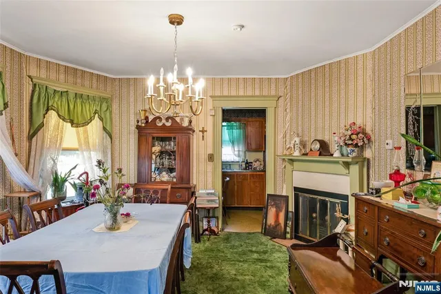 a view of a dining room with furniture window and outdoor view