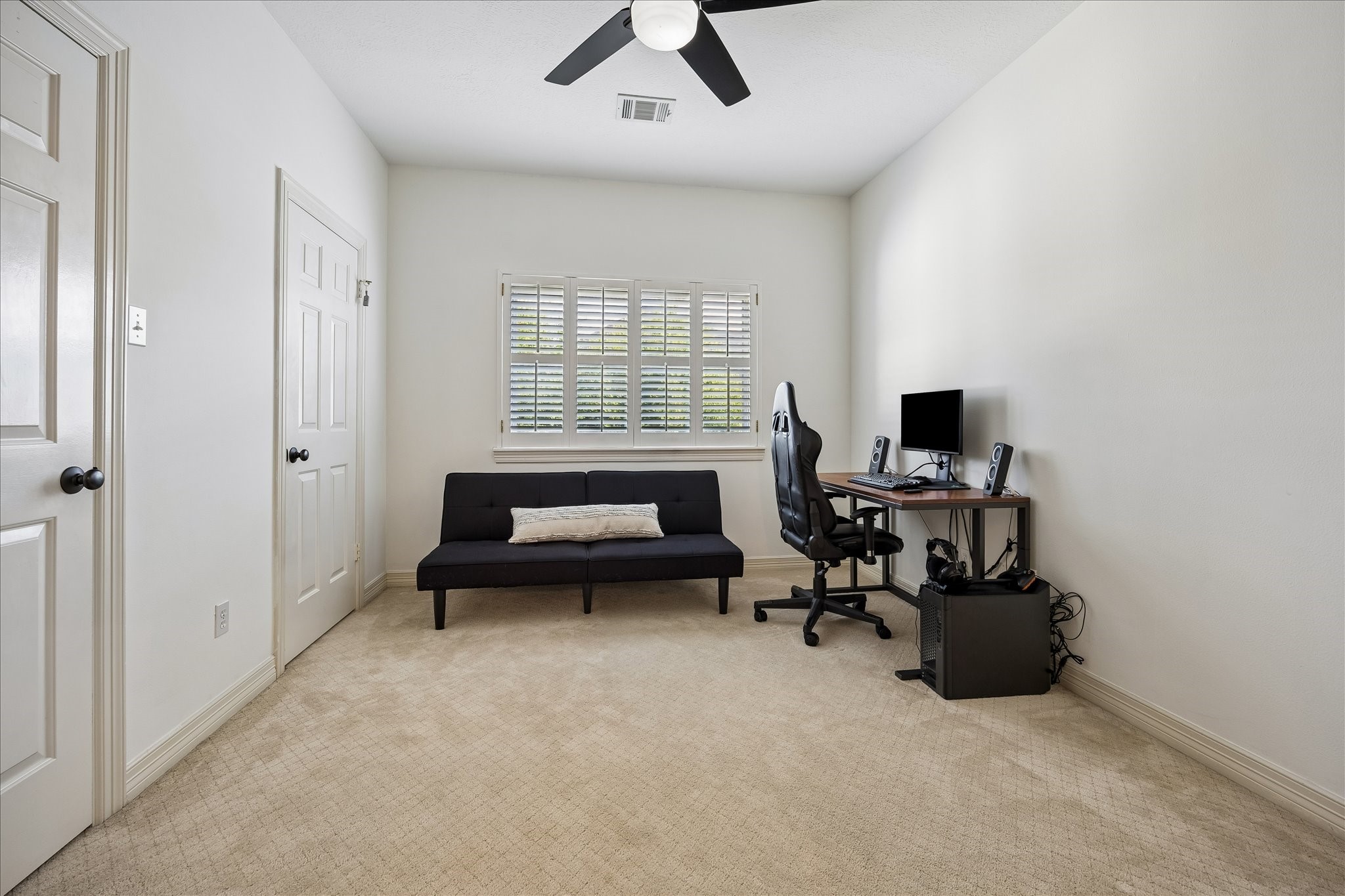4131 Sunset Boulevard Houston, TX 77005 - Photo 26 of 38 a view of a livingroom with workspace and a window