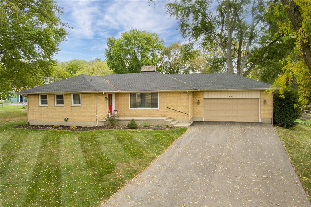 6950 Red Lion 5 Points Road Springboro, OH 45066 - Photo 65 of 78 This charming residence features a well-maintained exterior and inviting front entry.