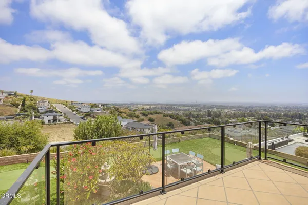 a view of roof with city view