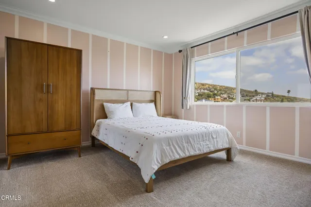 a view of a swimming pool and an outdoor seating