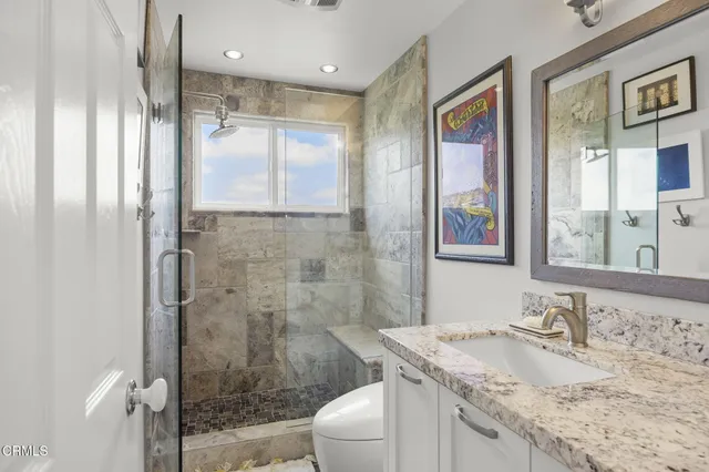 a view of a chairs and table in the patio