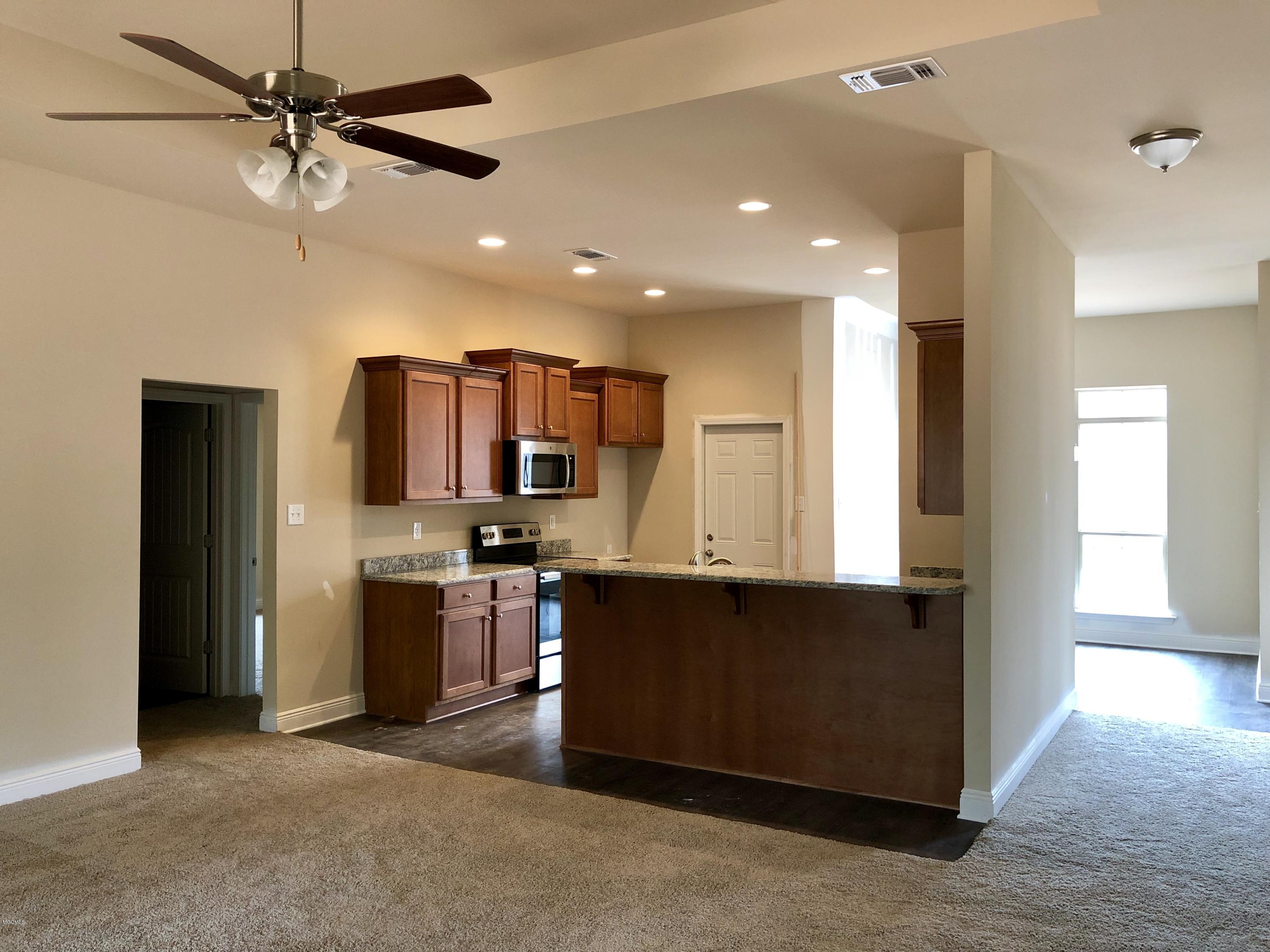 6801 Biddix Evans Road Ocean Springs, MS 39564 - Photo 7 of 25 Kitchen open to living area
