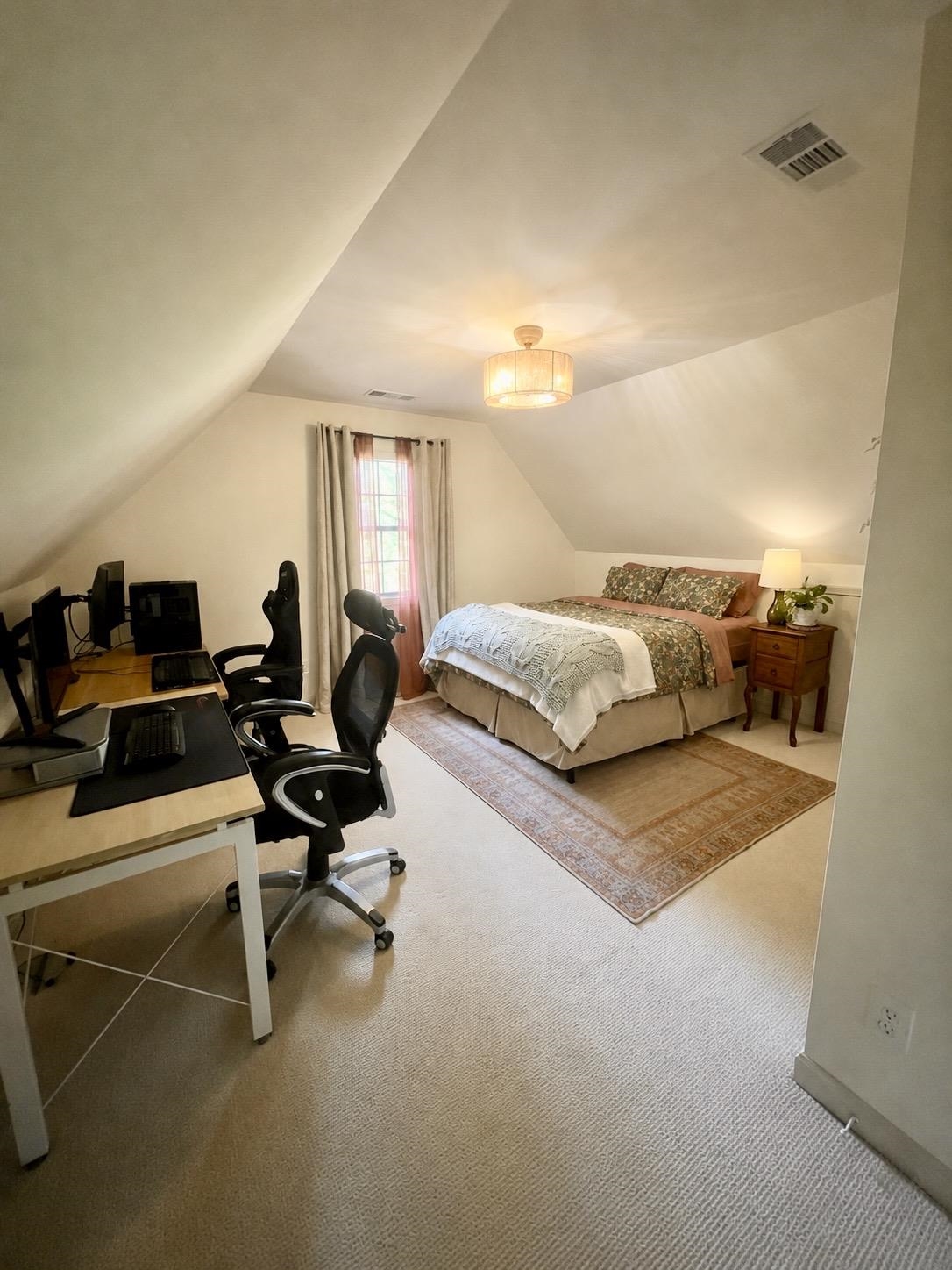 470 Rich Road Somerville, TN 38068 - Photo 35 of 40 Carpeted bedroom with sloped ceilings