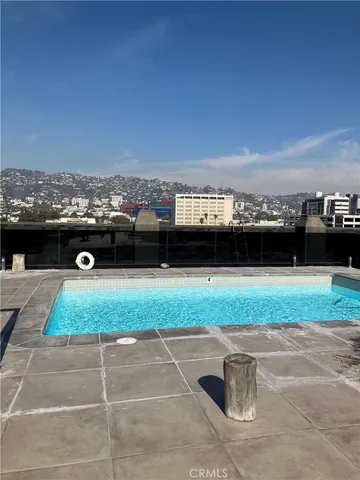 a view of a terrace with a garden