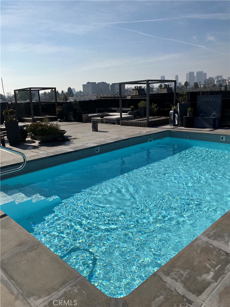 8811 Burton Way, Unit 202 Los Angeles, CA 90048 - Photo 19 of 19 a view of outdoor space and yard