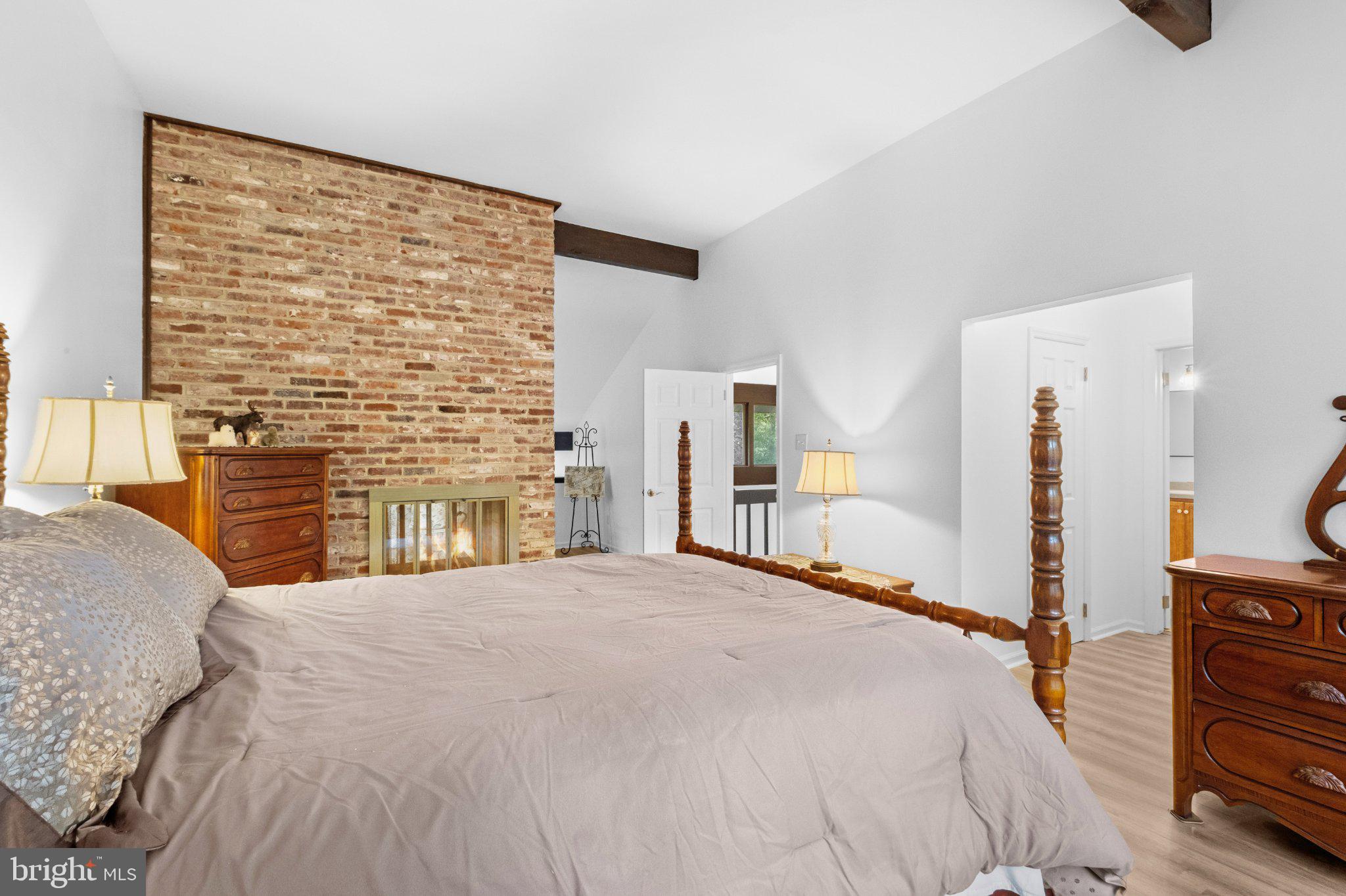131 Heath Road Medford, NJ 08055 - Photo 28 of 55 Primary Bedroom Suite with open loft and fireplace