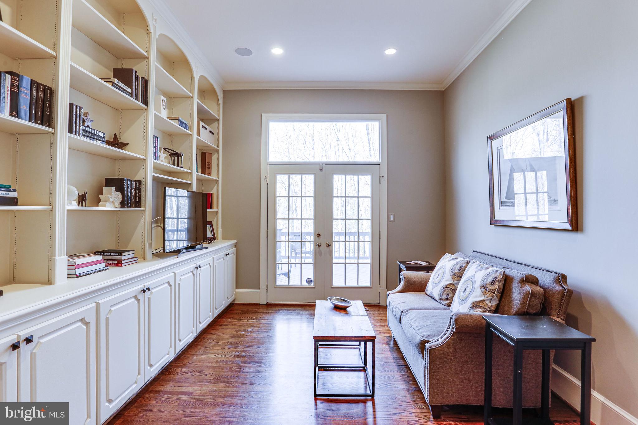 11622 Rolling Meadow Drive Great Falls, VA 22066 - Photo 17 of 45 Library w/ built-ins and french doors to deck
