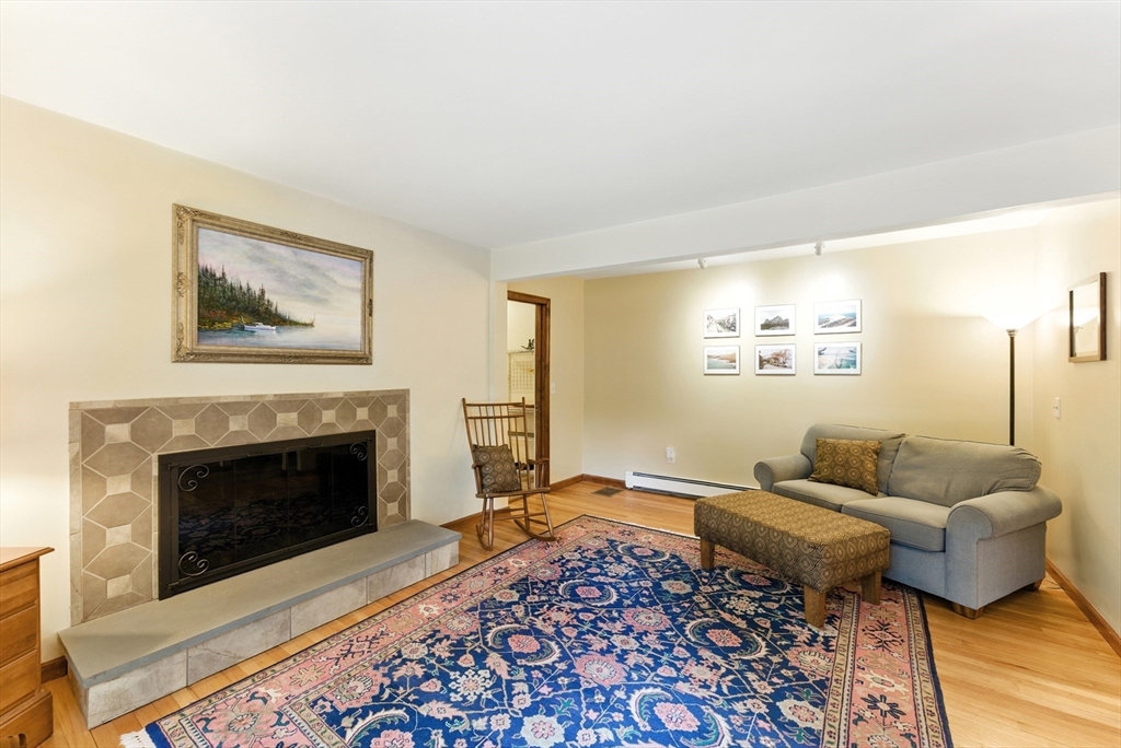 481 Kennedy Road Northampton, MA 01053 - Photo 11 of 40 a living room with furniture and a fireplace