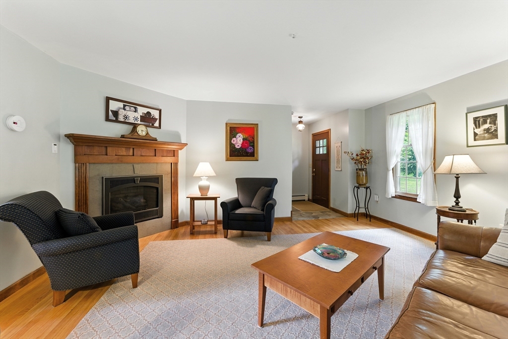 481 Kennedy Road Northampton, MA 01053 - Photo 13 of 40 a living room with furniture and a fireplace