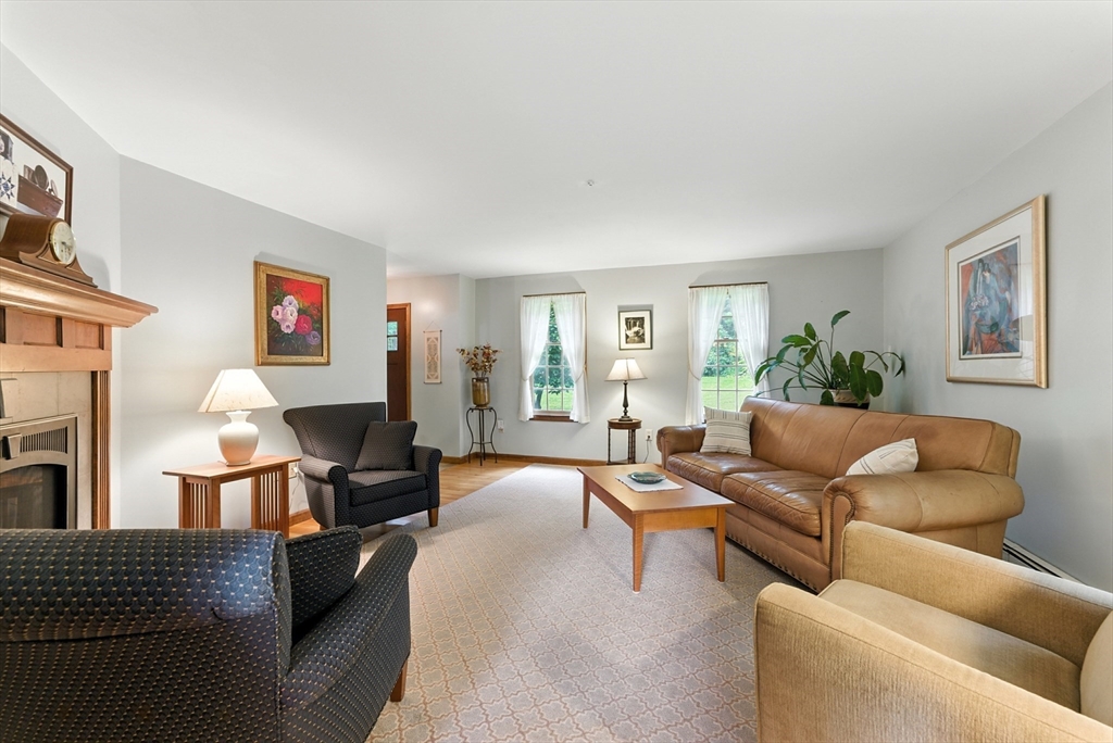 481 Kennedy Road Northampton, MA 01053 - Photo 14 of 40 a living room with furniture and a large window