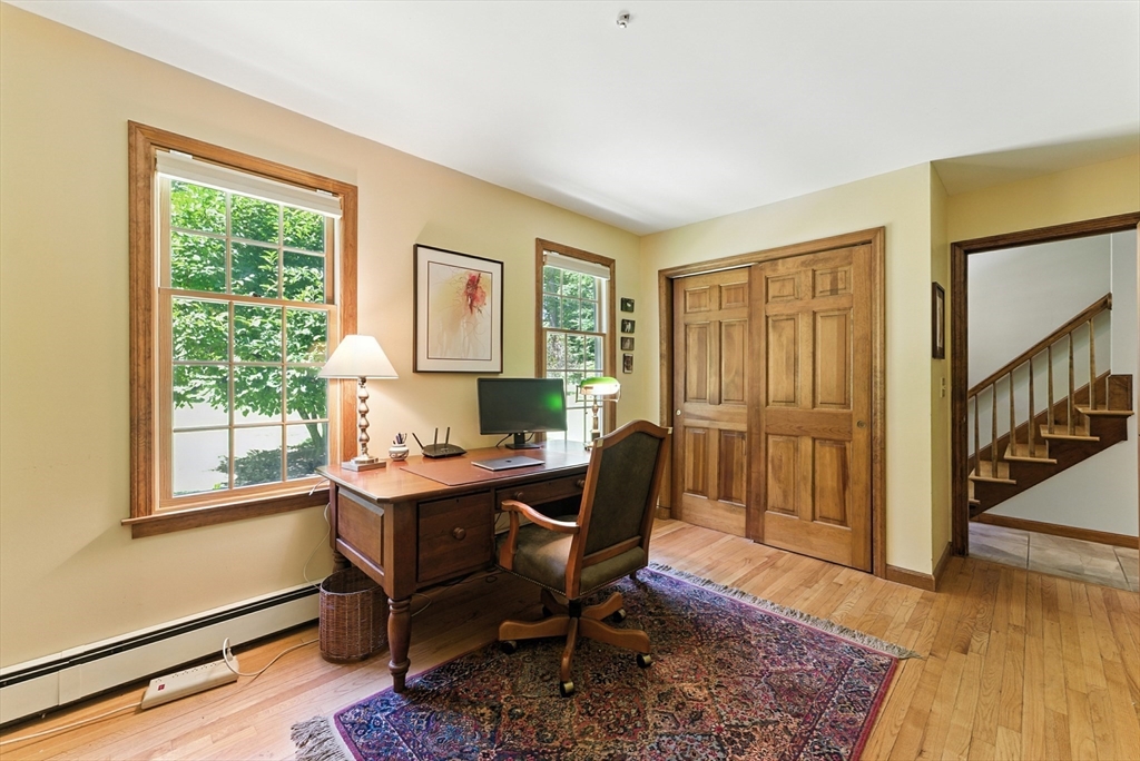 481 Kennedy Road Northampton, MA 01053 - Photo 16 of 40 a workspace with wooden floor and a window