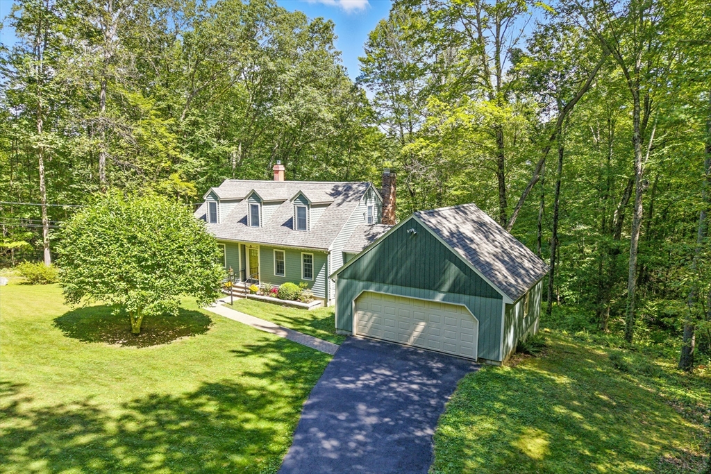 481 Kennedy Road Northampton, MA 01053 - Photo 2 of 40 a view of a house with a yard and potted plants