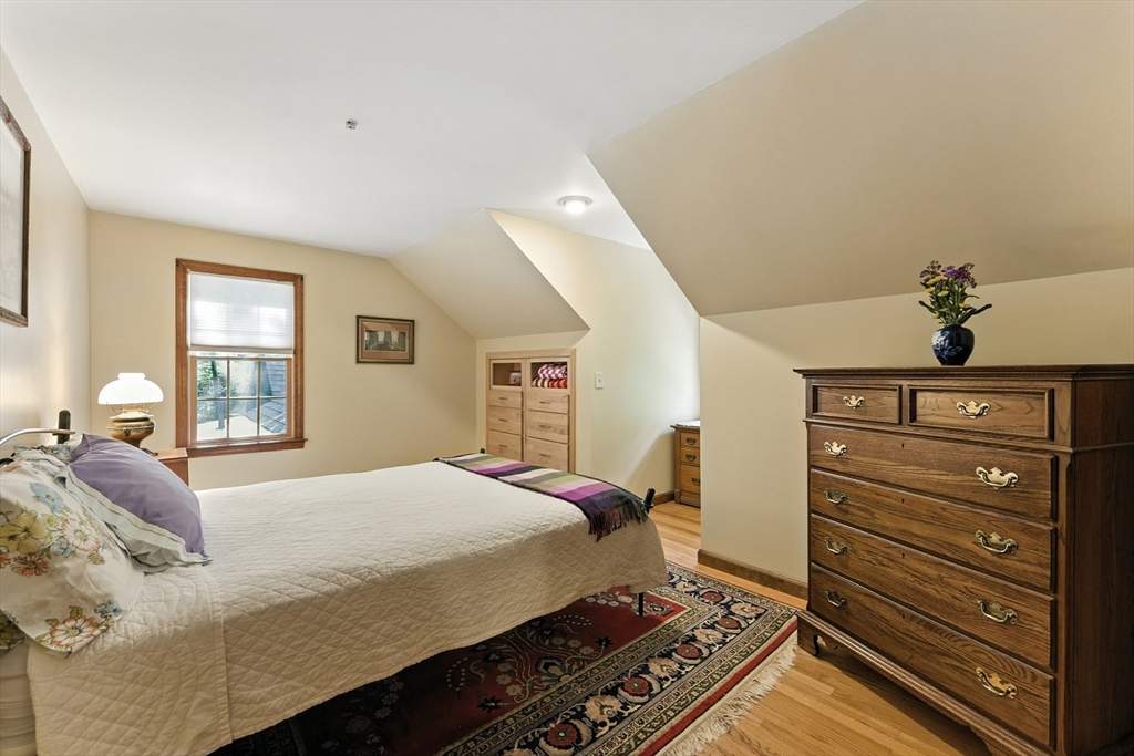 481 Kennedy Road Northampton, MA 01053 - Photo 26 of 40 a bedroom with a bed and a dresser