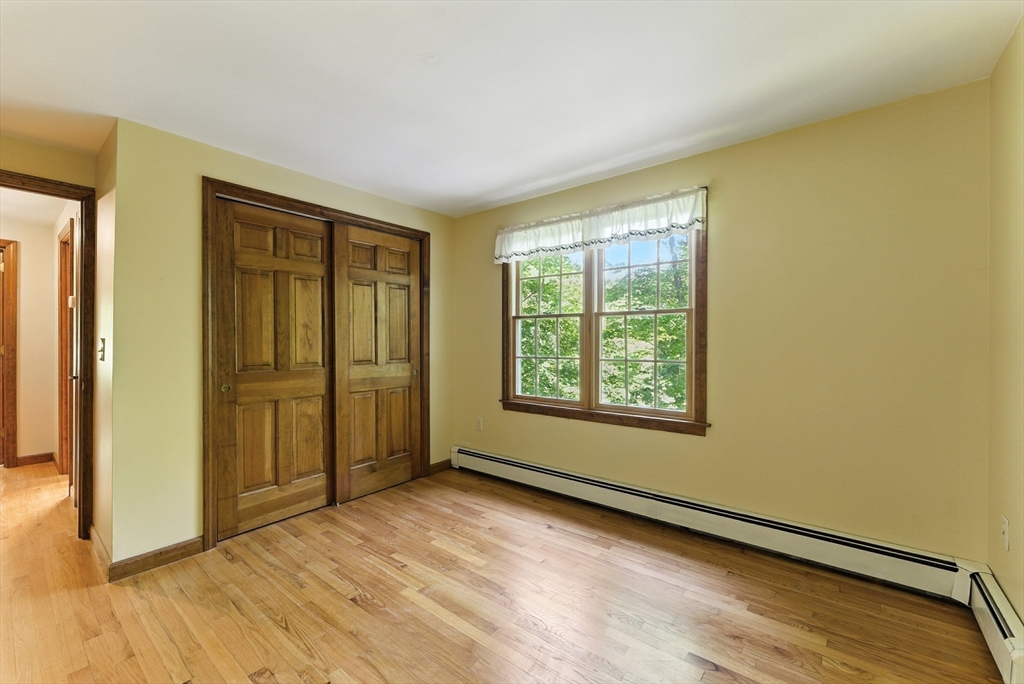 481 Kennedy Road Northampton, MA 01053 - Photo 28 of 40 a view of an empty room and window