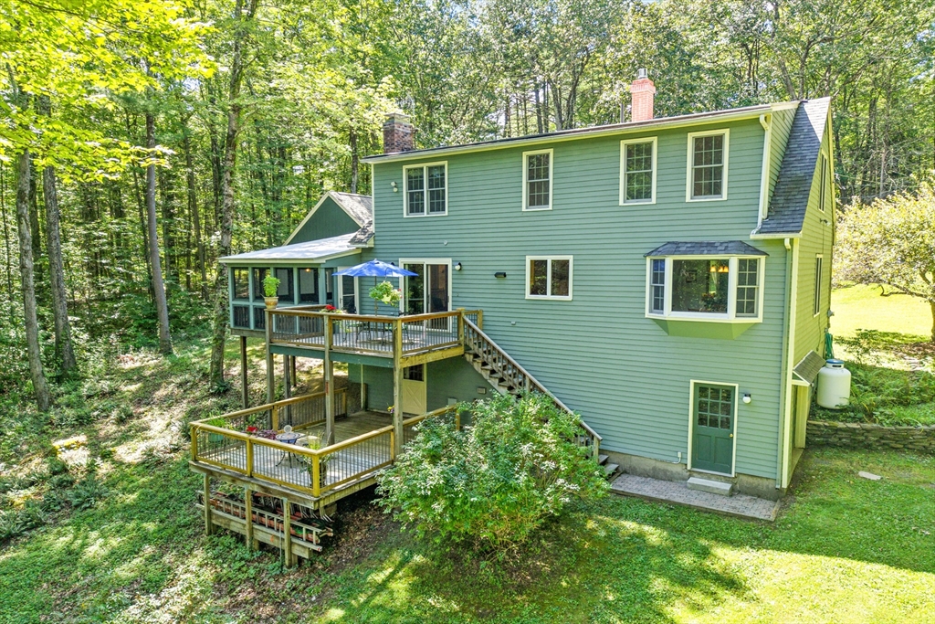 481 Kennedy Road Northampton, MA 01053 - Photo 3 of 40 a view of a house with a backyard