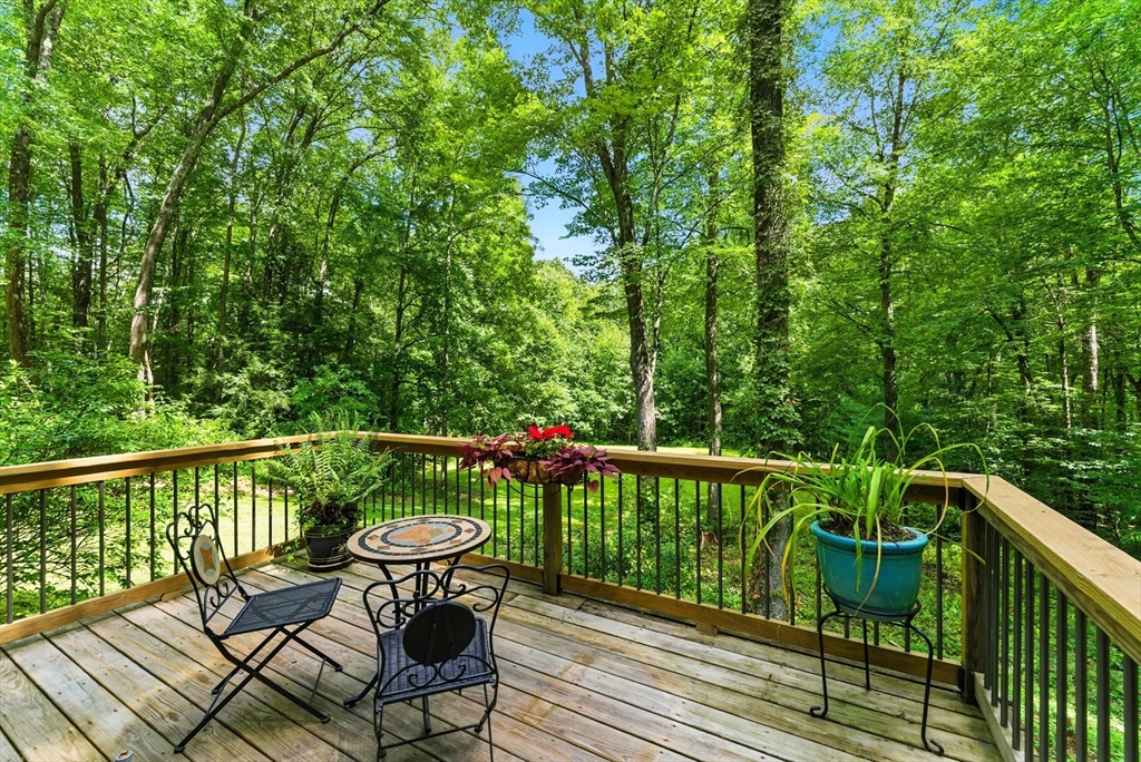 481 Kennedy Road Northampton, MA 01053 - Photo 32 of 40 a view of a balcony with wooden floor and outdoor seating