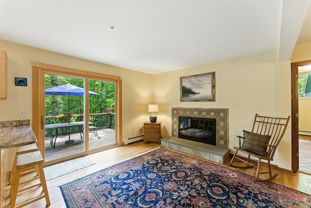 481 Kennedy Road Northampton, MA 01053 - Photo 10 of 40 a living room with furniture and a fireplace