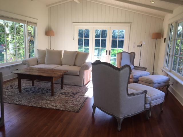 461 Live Oaks Road Montecito, CA 93108 - Photo 2 of 9 a living room with furniture a table and a large window