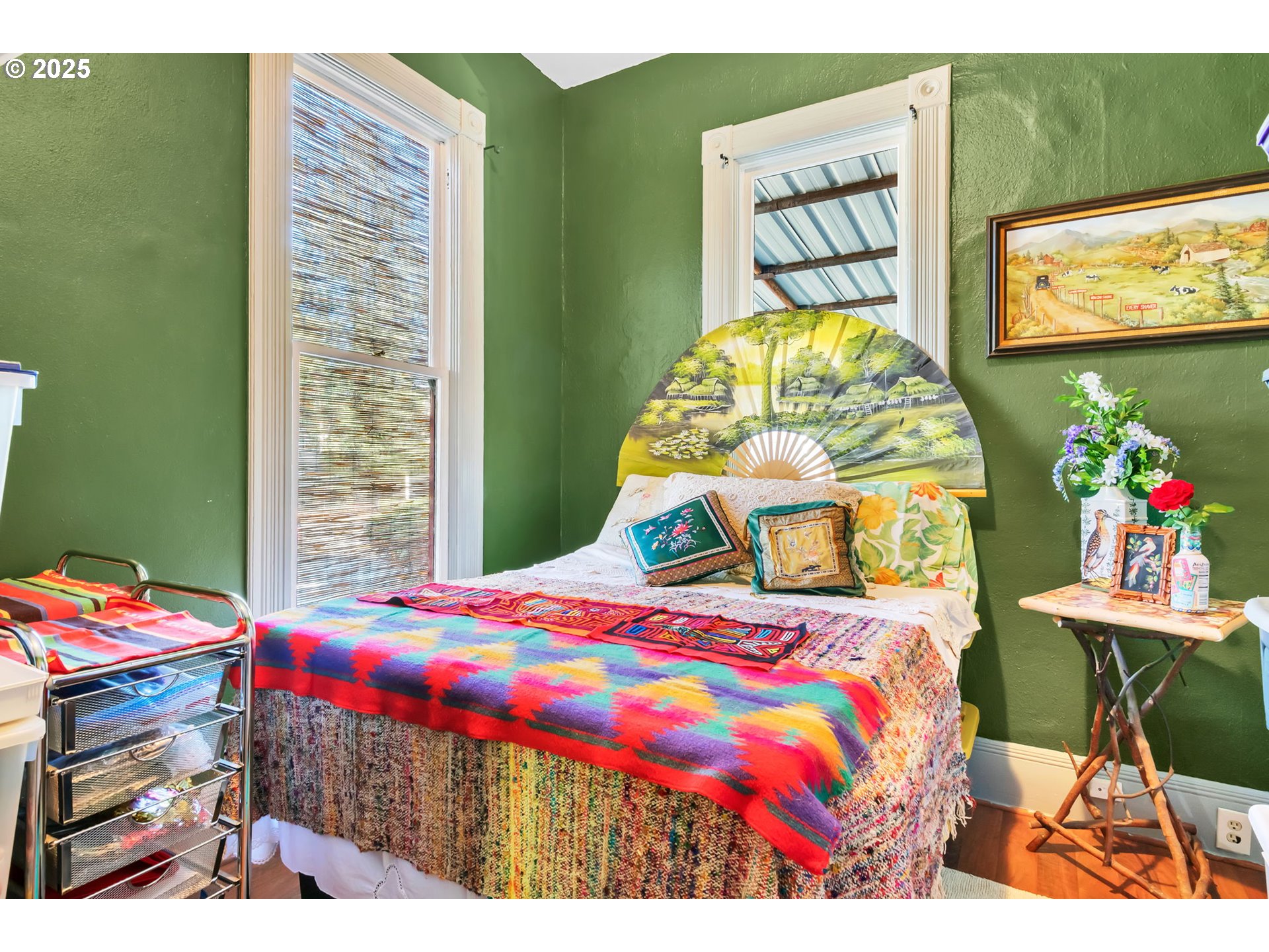 637 17th Street Northeast Salem, OR 97301 - Photo 15 of 34 a bedroom with a bed a computer on the table and a lamp