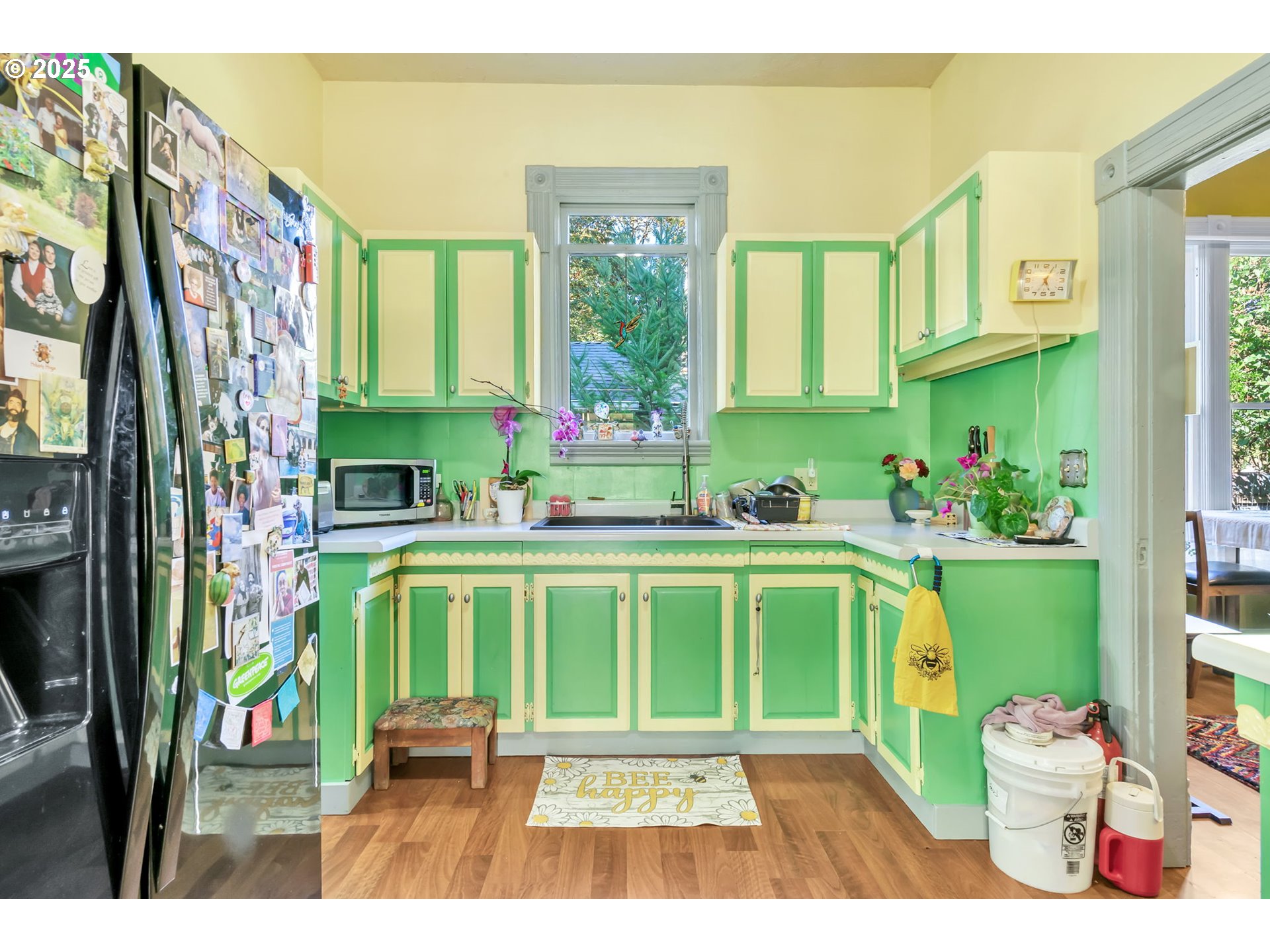637 17th Street Northeast Salem, OR 97301 - Photo 16 of 34 a living room with a fireplace furniture and a large window