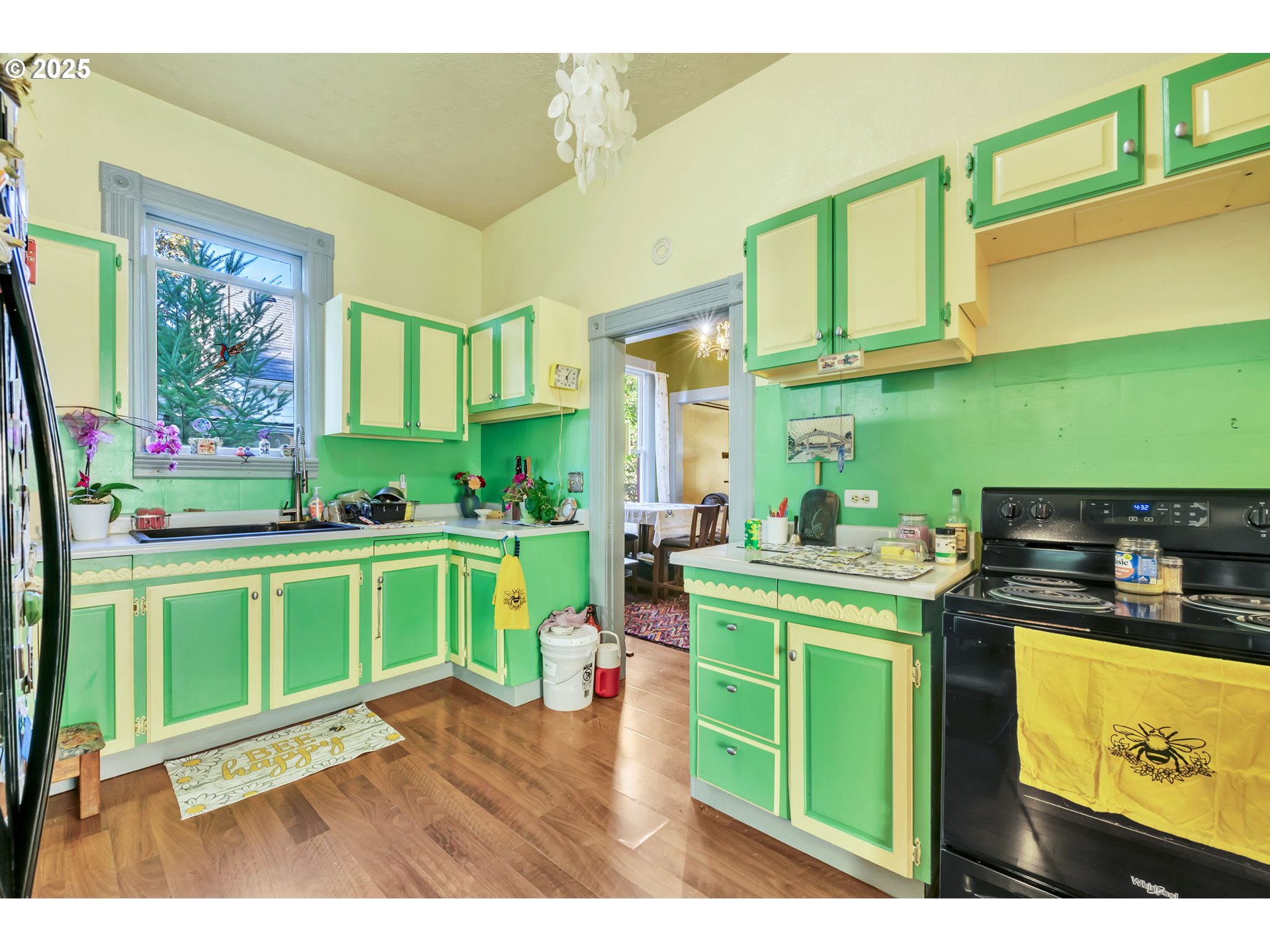 637 17th Street Northeast Salem, OR 97301 - Photo 17 of 34 a kitchen with a sink cabinets and a window
