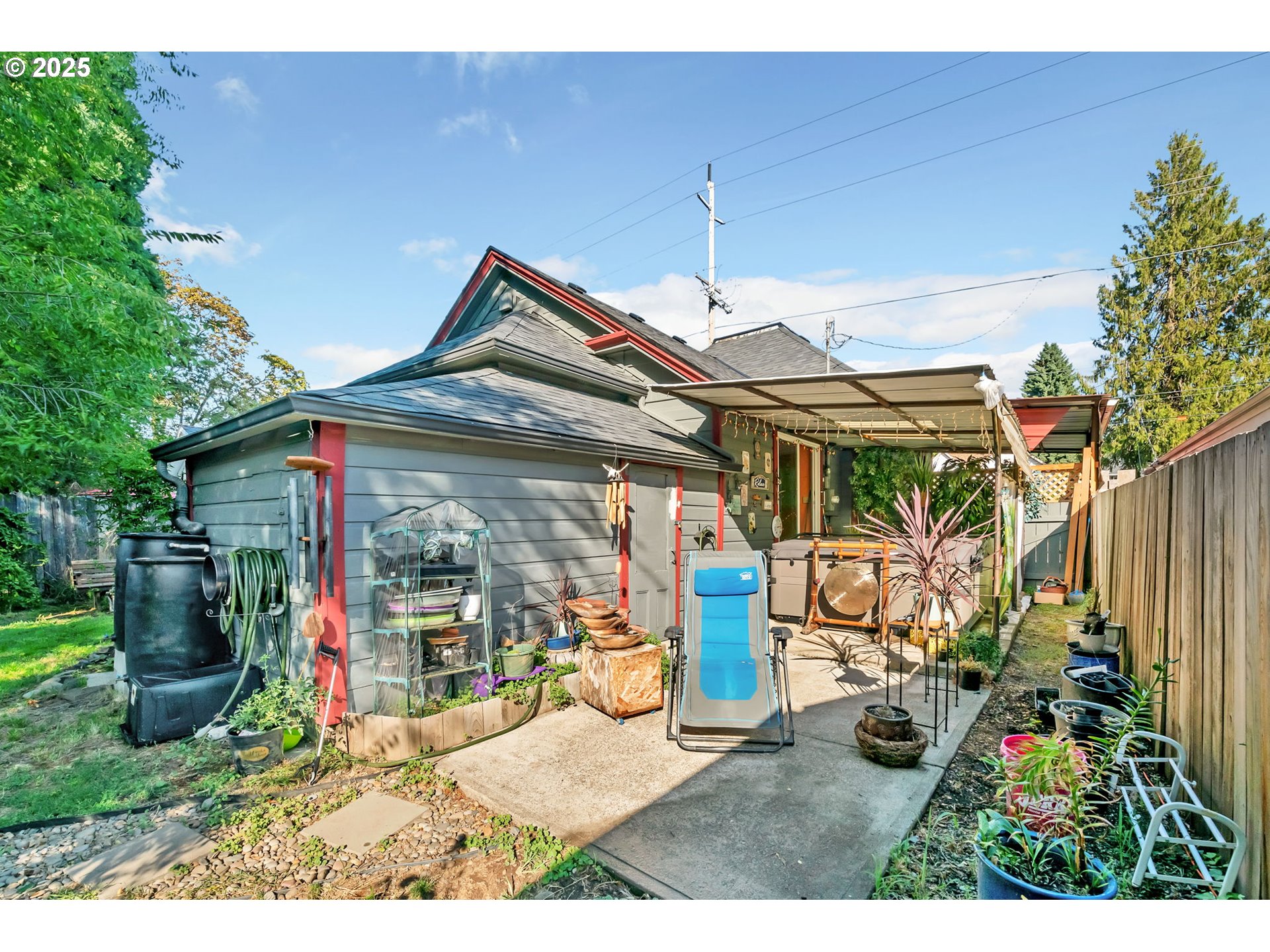 637 17th Street Northeast Salem, OR 97301 - Photo 24 of 34 a view of a porch with a lot of flower plants