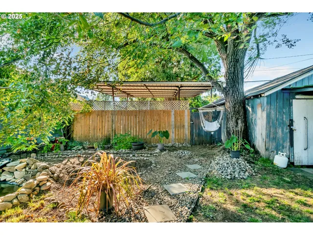 a backyard of a house with lots of green space