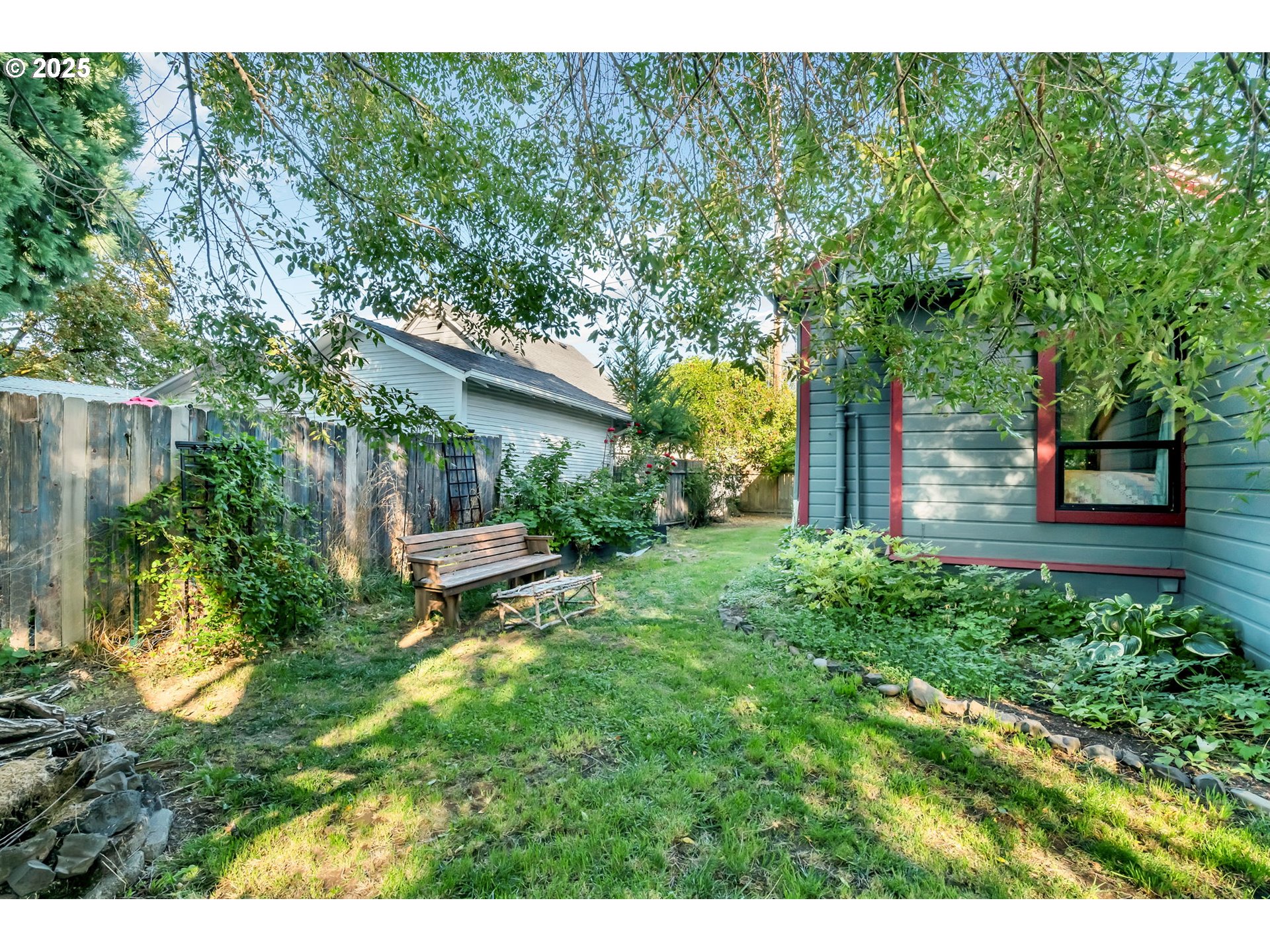 637 17th Street Northeast Salem, OR 97301 - Photo 28 of 34 a view of a house with a tree and plants