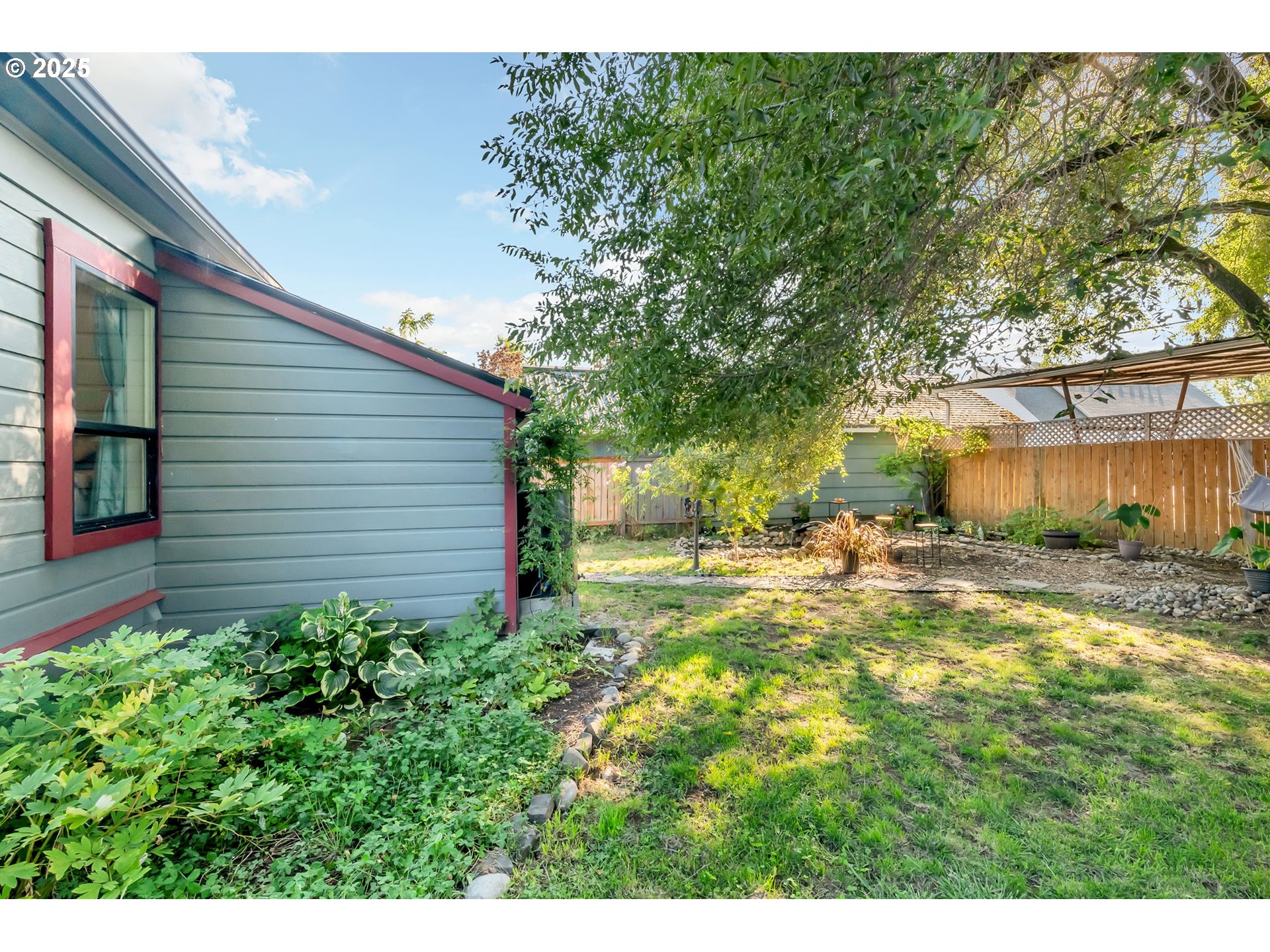 637 17th Street Northeast Salem, OR 97301 - Photo 30 of 34 a view of a backyard with garden