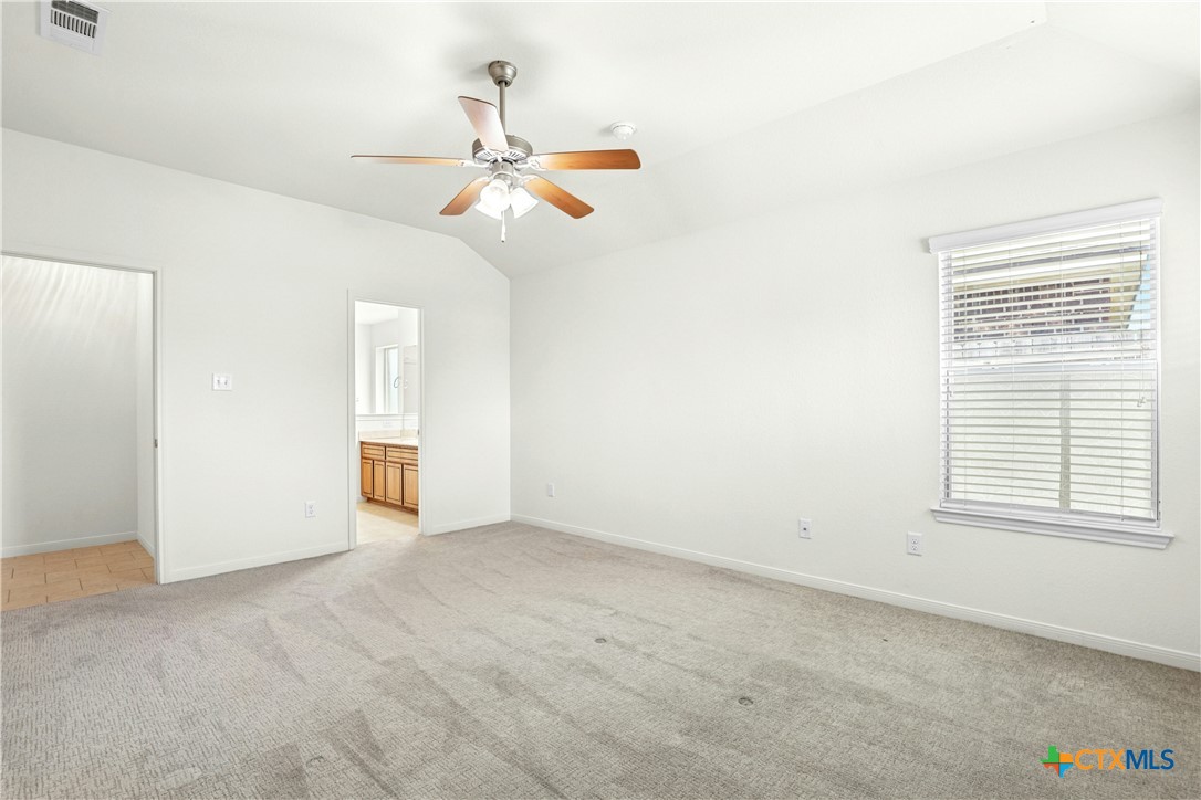 3203 Canadian River Loop Killeen, TX 76549 - Photo 15 of 27 an empty room with windows and fan