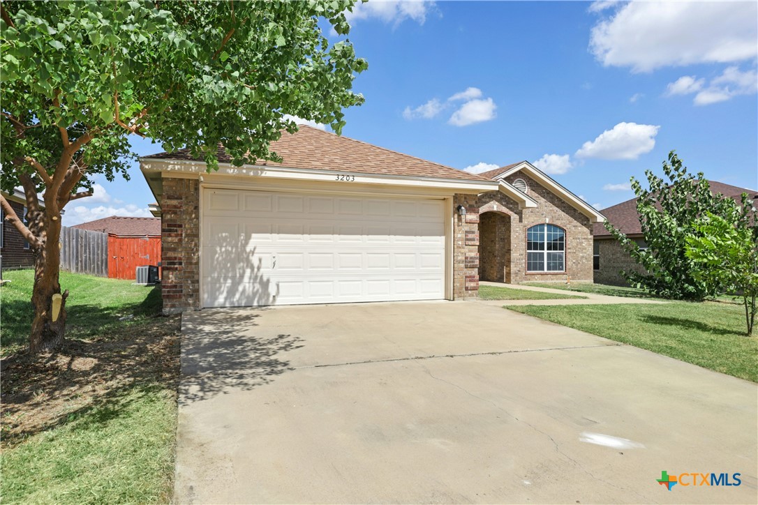 3203 Canadian River Loop Killeen, TX 76549 - Photo 2 of 27 a view of a house with a yard
