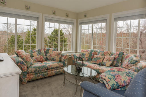140 Great Marsh Road West Barnstable, MA 02668 - Photo 15 of 30 a living room with furniture and a large window