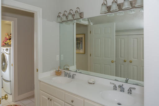 140 Great Marsh Road West Barnstable, MA 02668 - Photo 20 of 30 a bathroom with a double vanity sink and a mirror